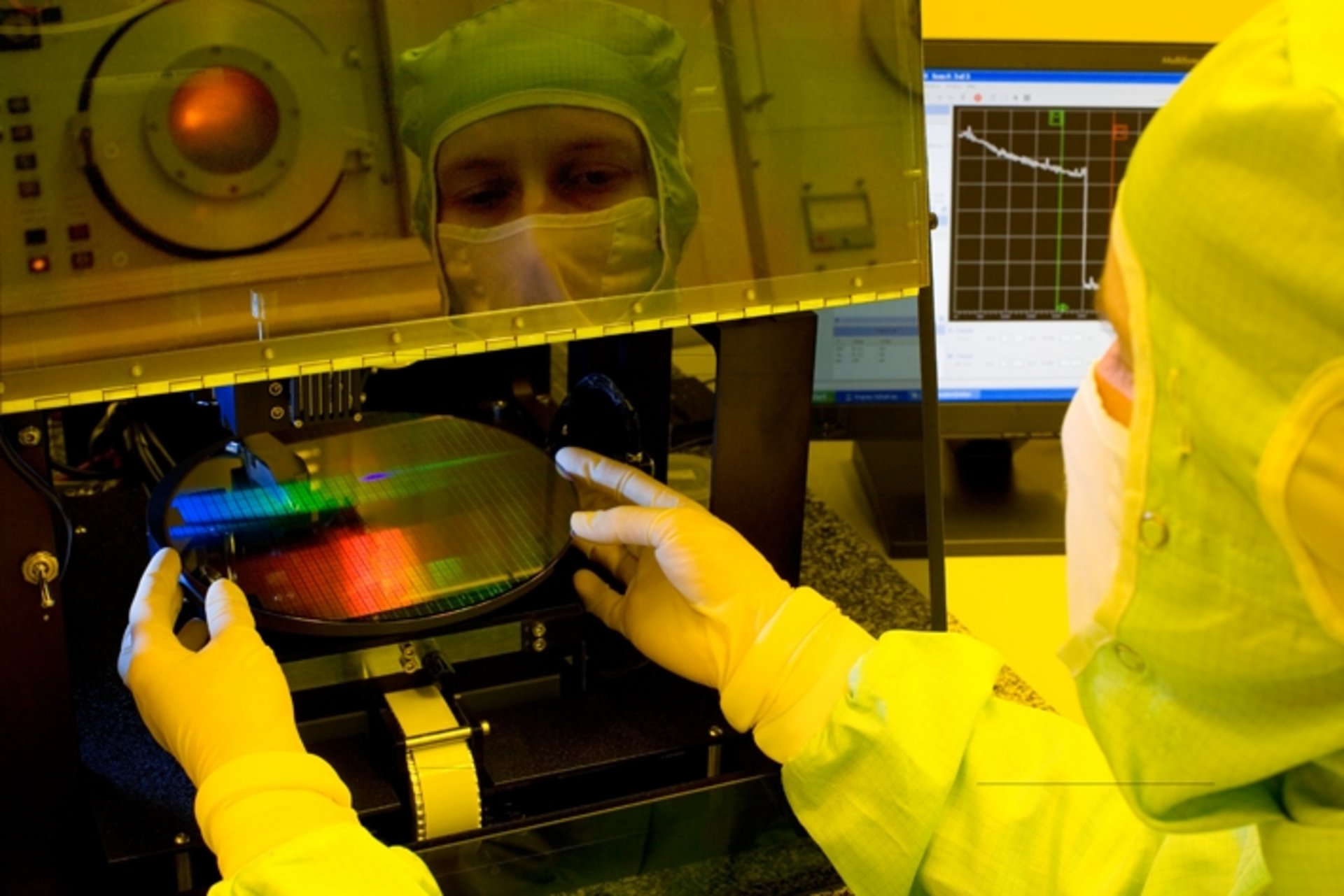 a person working in the IFW cleanroom