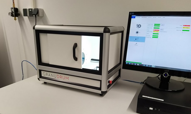 Powder analyzer Camsizer X2 by Retsch with X-DRY module in a laboratory setting.