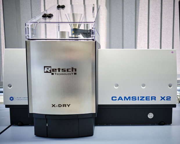 Powder analyzer Camsizer X2 by Retsch with X-DRY module in a laboratory setting.
