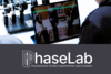 PhaseLab student laboratory at IFW Dresden: An optical experimental setup with a laser beam is viewed using a tablet.