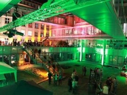 green illuminated courtyard of IFW during long night of sciences.