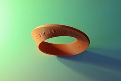 Ein orangefarbener topologischer Ring vor grünem Hintergrund.